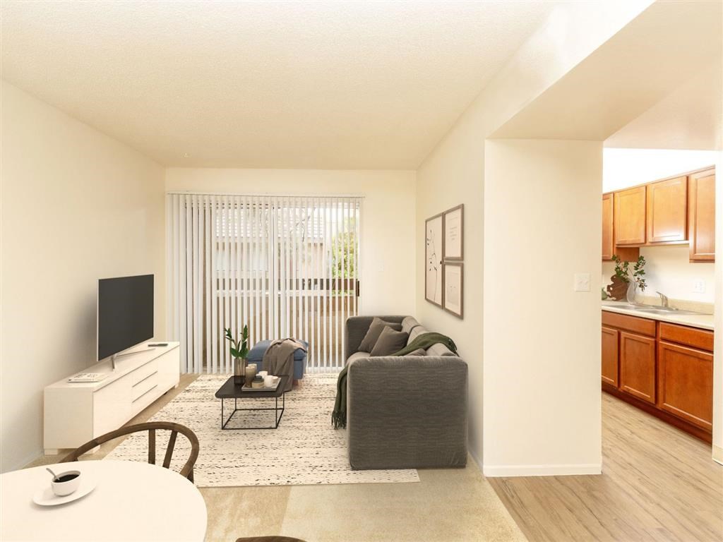 Classic Living Room Design With Television at Cimarron Place Apartments, Tucson, AZ