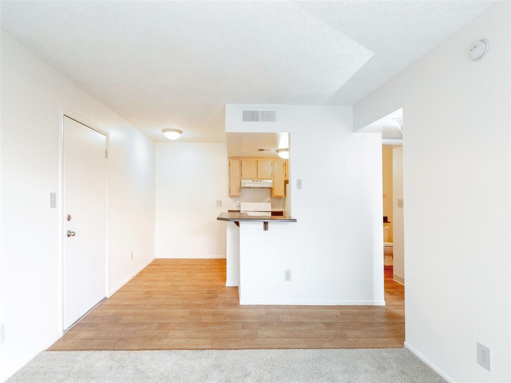 Living Room with Kitchen View at Cimarron Place Apartments, Tucson, AZ, 85712