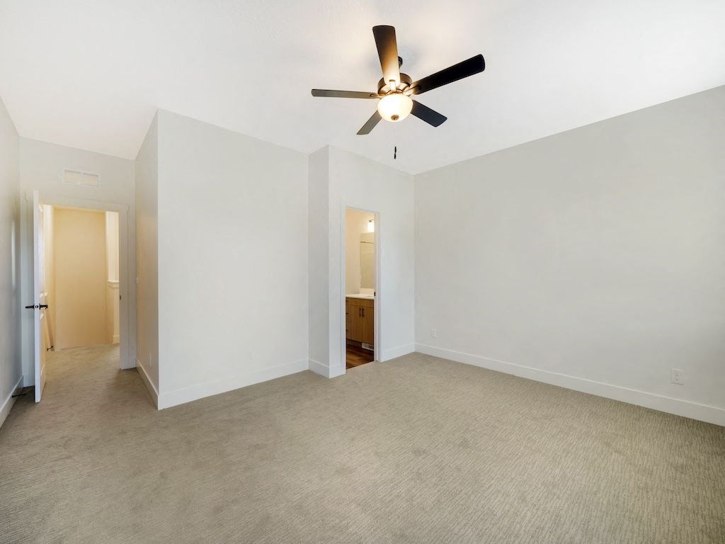 Bedroom with Ceiling Fan at Orchard Park Townhomes