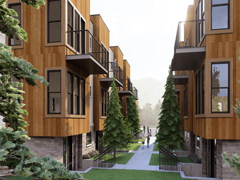 A modern apartment complex with balconies and trees.