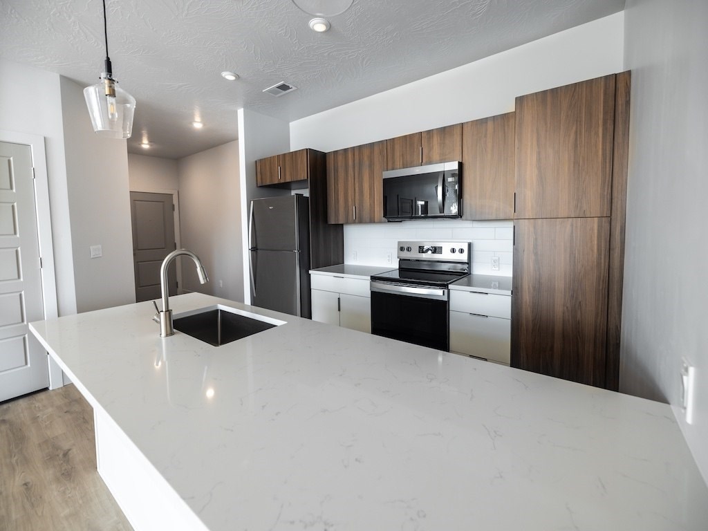 Brown Cabinets in Kitchen at The Ash