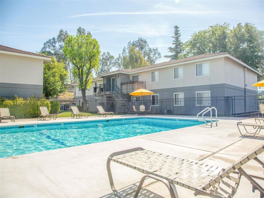 Poolside Relaxing Area at Courtyard at Central Park Apartments, California
