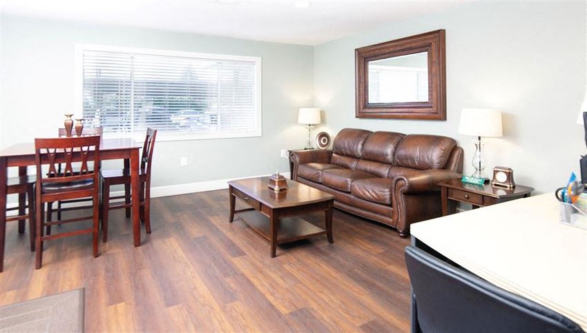 Living Room Dining Area Living Room Dining Area at Courtyard at Central Park Apartments, Fresno, California