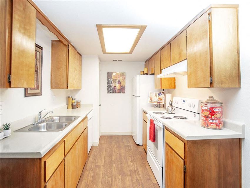 Modern Kitchen With Custom Cabinet Modern Kitchen With Custom Cabinet at Courtyard at Central Park Apartments, Fresno