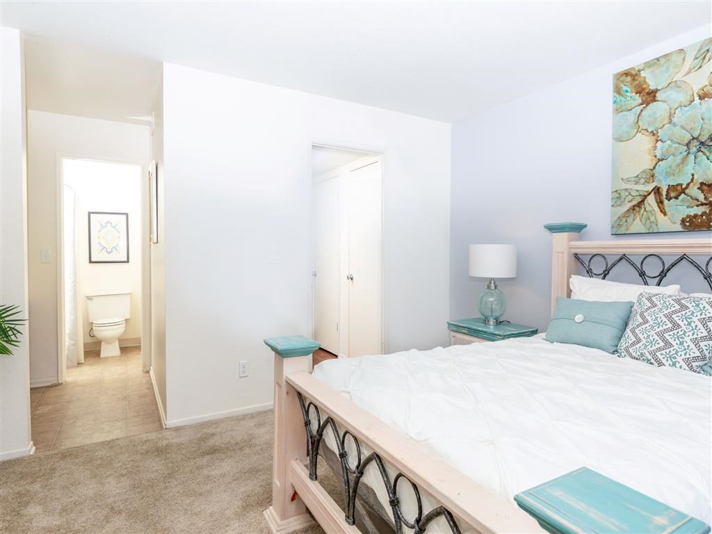 Large Comfortable Bedrooms With Closet at Heron Pointe Apartments & Townhomes, Fresno