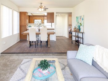 Living Room With Kitchen View Living Room With Kitchen View at Edgewater Isle Apartments & Townhomes, Hanford, 93230 - Photo Gallery 6