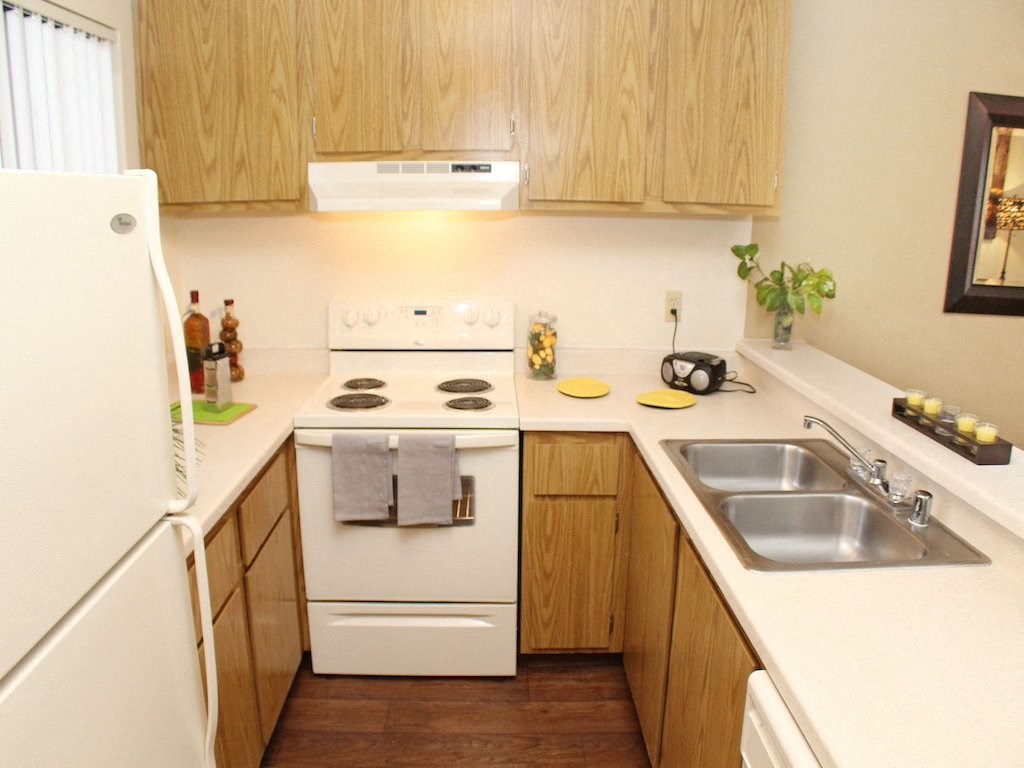 California Place Classic Kitchen with White Appliances