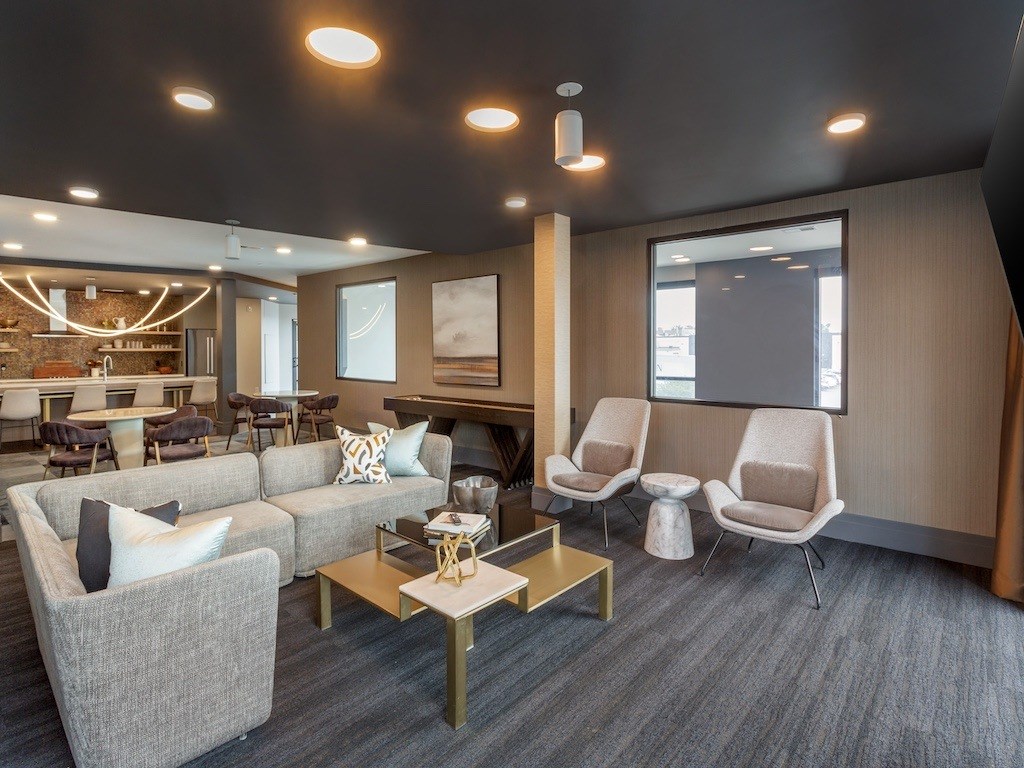 Chairs and Couch in Clubhouse at City Lofts Apartments