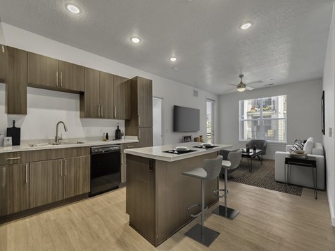 A modern kitchen with wooden cabinets and a central island.