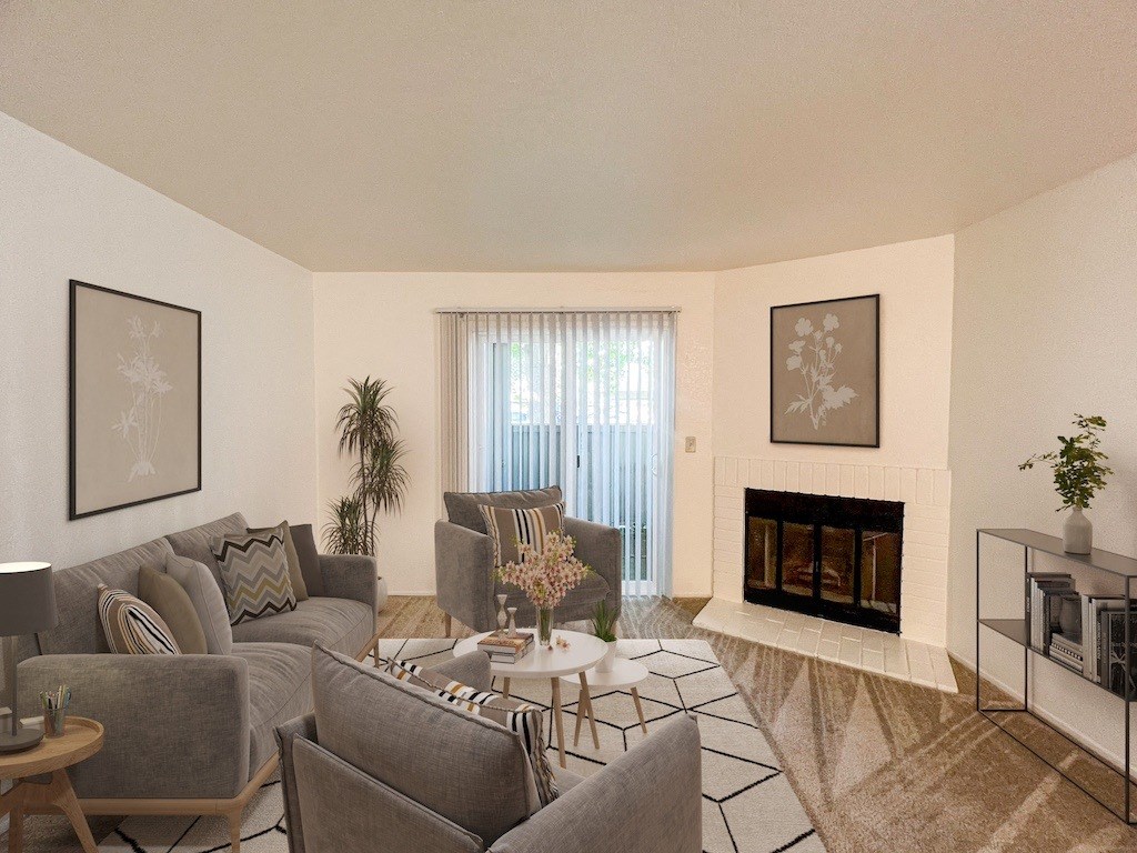 Living Room with Fireplace at Chesapeake Commons Apartments