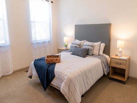 Four Seasons Logan Apartments and Townhomes Comfy Bedroom