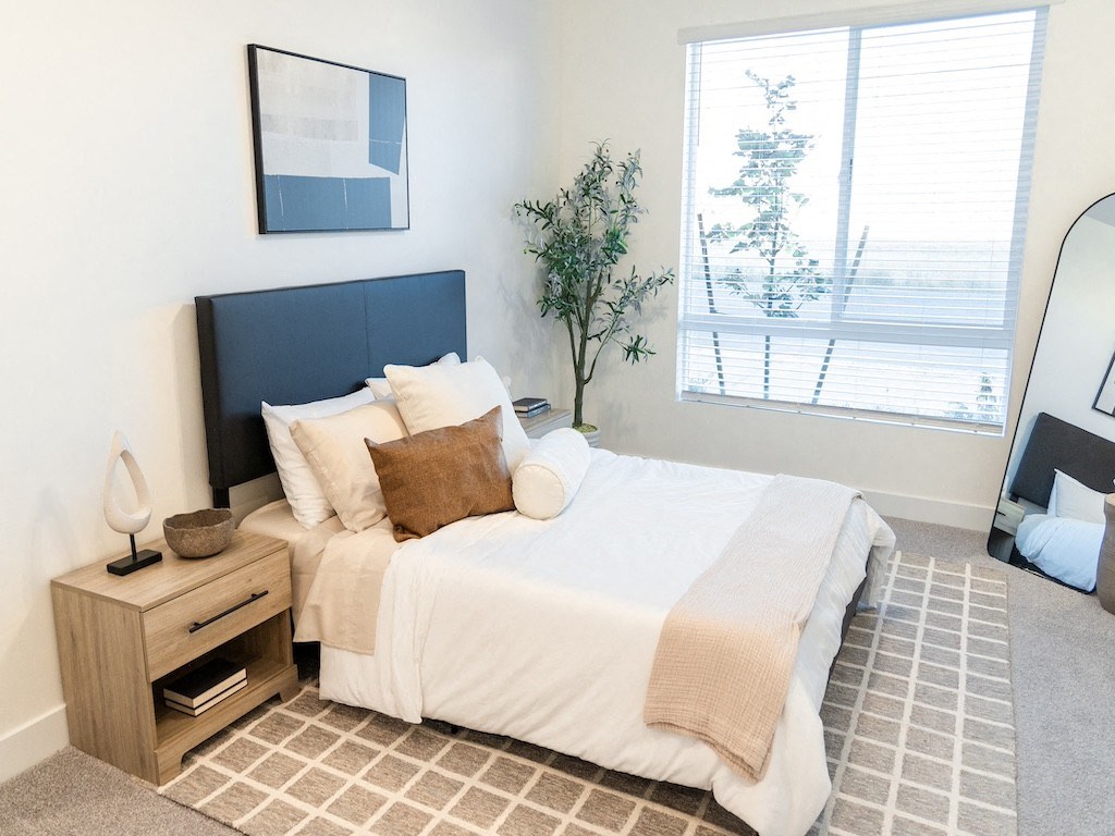 Bedroom with a Large Window at The Arza, American Fork 84003