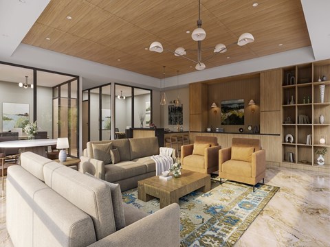 A living room with a large couch, a chair, and a coffee table.