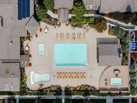 Four Seasons Apartments and Townhomes Drone View of Pool