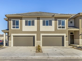 Front Driveway Front Driveway at Desert Sage Townhomes, Hurricane, Utah - Photo Gallery 2