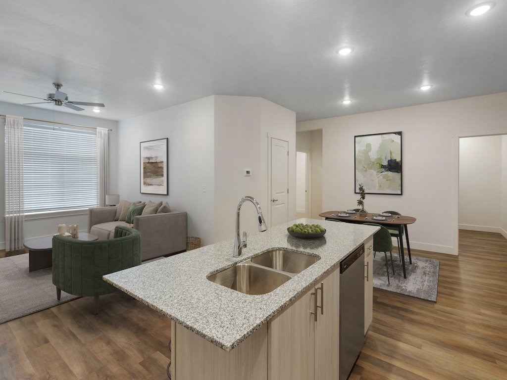 Kitchen View into Living Room at Magnolia at Homestead staged