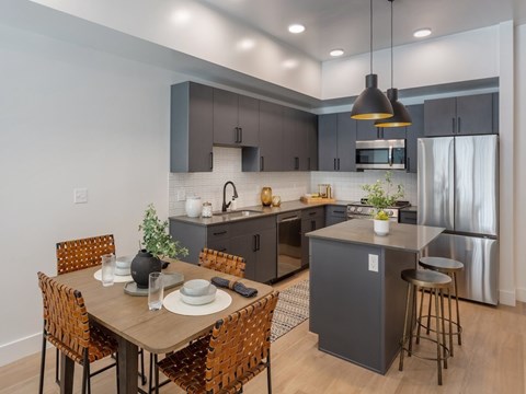 Kitchen and Dining at Maye House Apartments