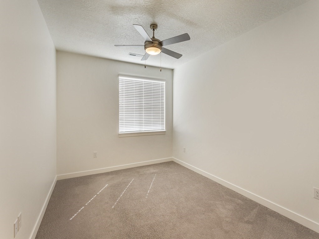 Large Bedroom with Ceiling Fan at The Sage Apartments Large Bedroom with Ceiling Fan at The Sage Apartments