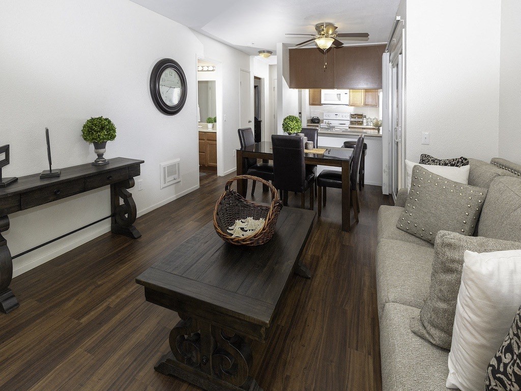 Living Room with Kitchen View at Eucalyptus Grove Apartments, California