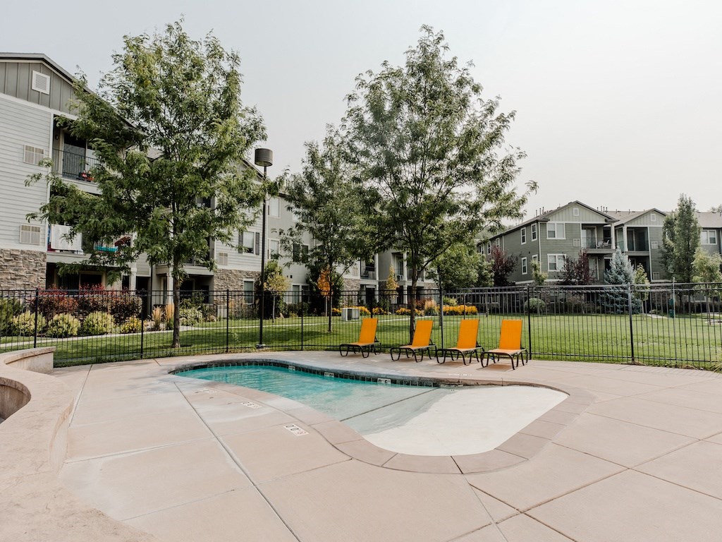 Outdoor Pool Area at Falls at Riverwoods