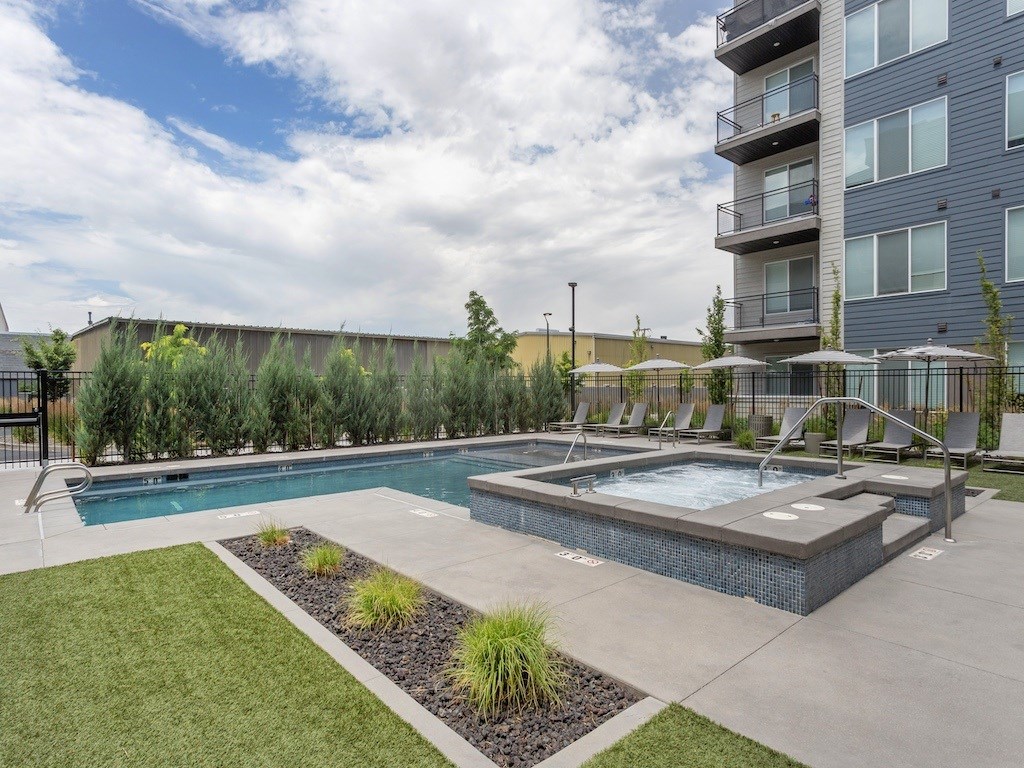 Lounge Chairs by Pool at City Lofts Apartments