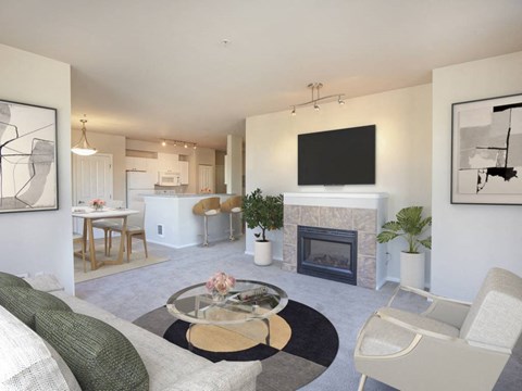 a living room with a fireplace and a table