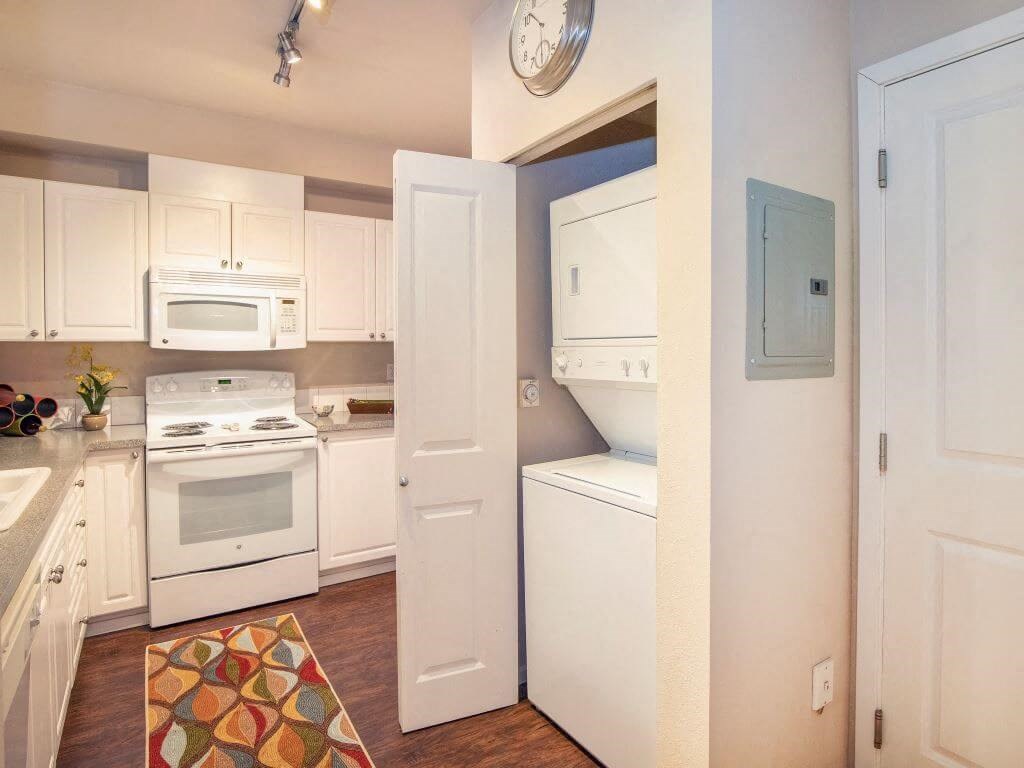 Convenient Tower Washer/Dryer In Unit  at Metropolitan Collection Apartments, Renton, WA, 98057