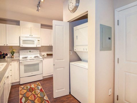 Convenient Tower Washer/Dryer In Unit  at Metropolitan Collection Apartments, Renton, WA, 98057
