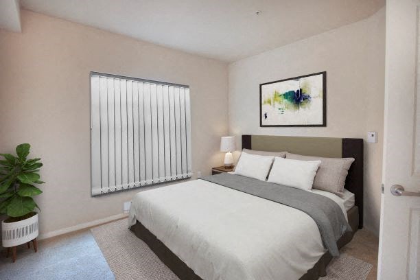 Bedroom With Expansive Windows at Metropolitan Place Apartments, Renton, WA