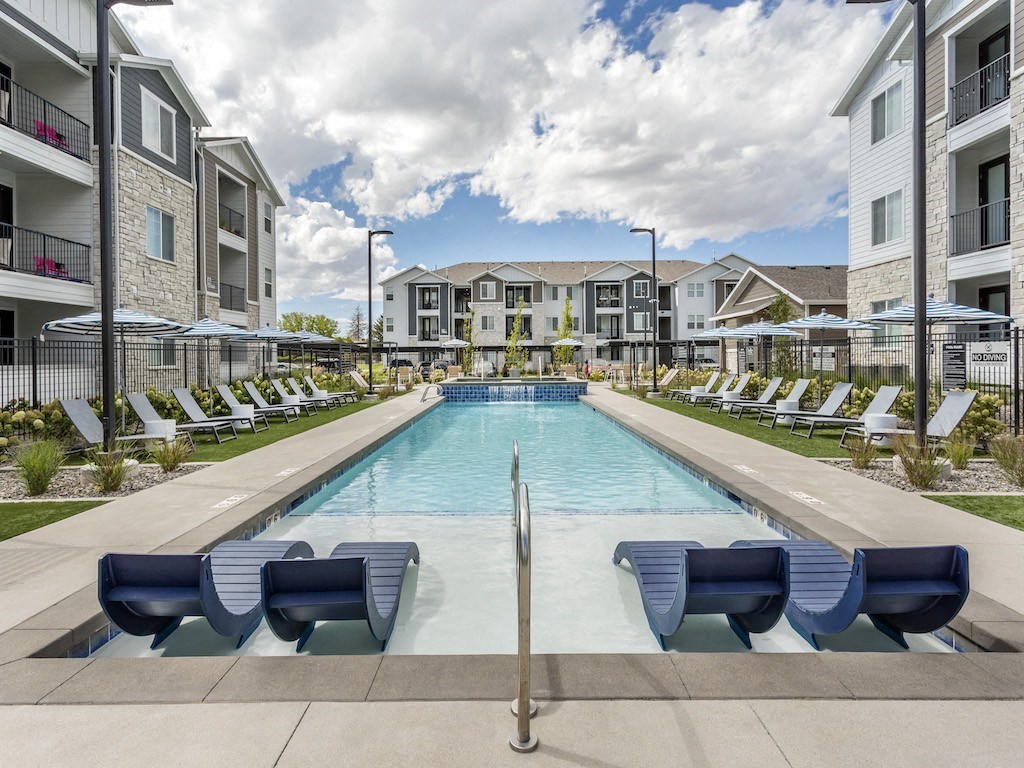 Lounge Chairs at Swimming Pool at The Sage Apartments