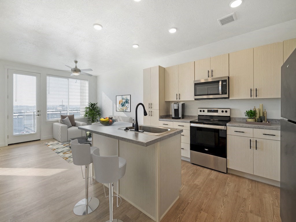 Kitchen with Living Room in One Bedroom Apartment at City Lofts Kitchen with Living Room in One Bedroom Apartment at City Lofts