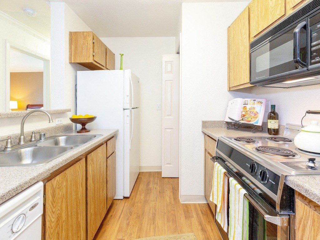Modern Kitchen With Custom Cabinets at Chesapeake Commons Apartments, California, 95670 Modern Kitchen With Custom Cabinets at Chesapeake Commons Apartments, California, 95670