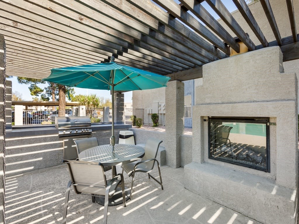 Outdoor Seating and Fireplace at Aztec Springs