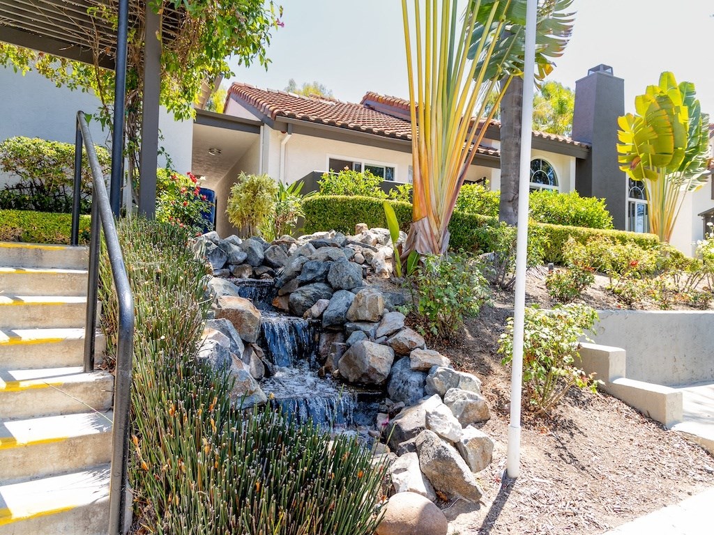 Outdoor waterfall at Eucalyptus Grove Apartments California