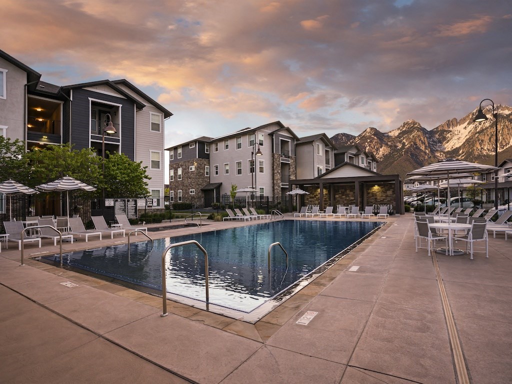 Parc at Day Dairy with Outdoor Pool and Mountains in the Background