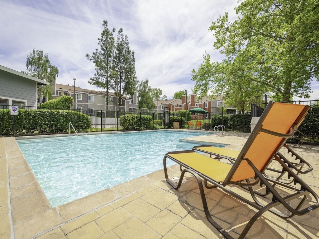 Pool With Sunning Deck at Chesapeake Commons Apartments, California, 95670