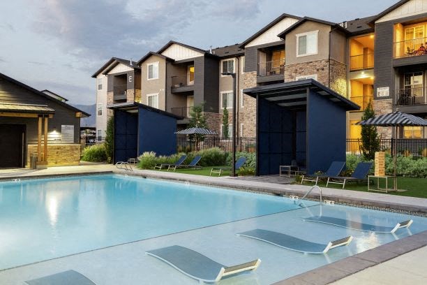 Relaxing Pool Area With Sundeck at Parc on 5th Apartments & Townhomes, American Fork, UT