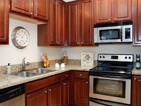 upgraded kitchen with stainless steel appliances at Metropolitan Collection Apartments, Renton, WA, 98057