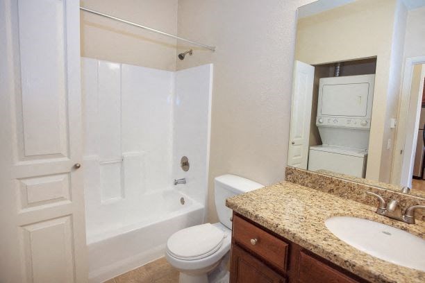 Bathroom with Granite Countertops at Revo 225 Apartments, Renton, WA, 98057