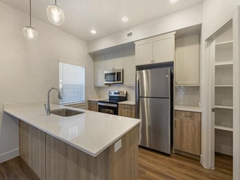 Spacious Kitchen with Stainless Steel Appliances Spacious Kitchen with Stainless Steel Appliances at Desert Sage Townhomes, Hurricane - Photo Gallery 3