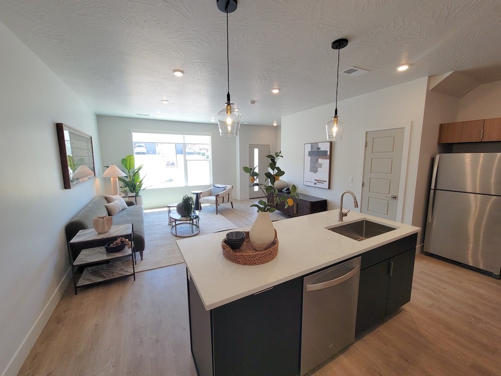 The Ash Apartments & Townhomes Kitchen and Living Room