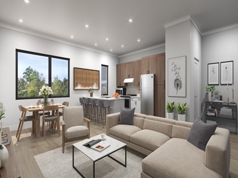 A modern living room with a dining table and a kitchen in the background.
