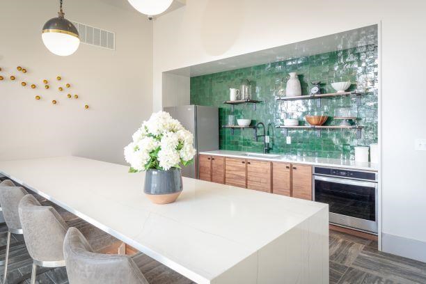 Clubroom Kitchen with Island at Parc on 5th Apartments & Townhomes, American Fork