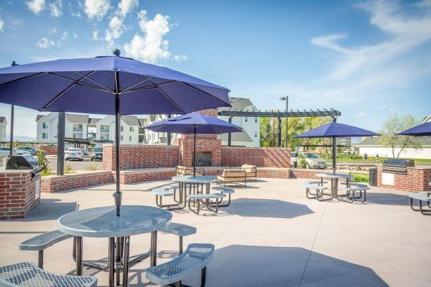 Grilling Station with Picnic Tables and Fireplace  at Rivulet Apartments, American Fork, Utah