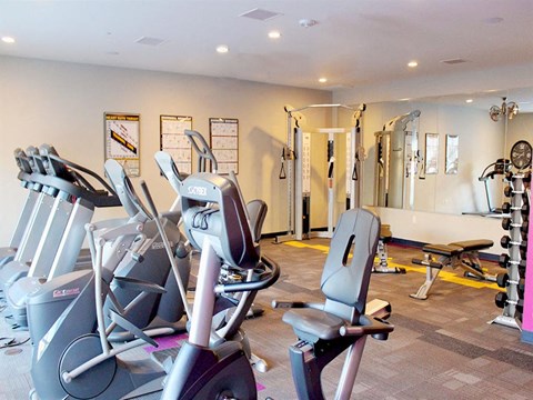Fully Equipped Gym with Treadmills & Stationary Bikes at Kimpton Square Senior Apartments