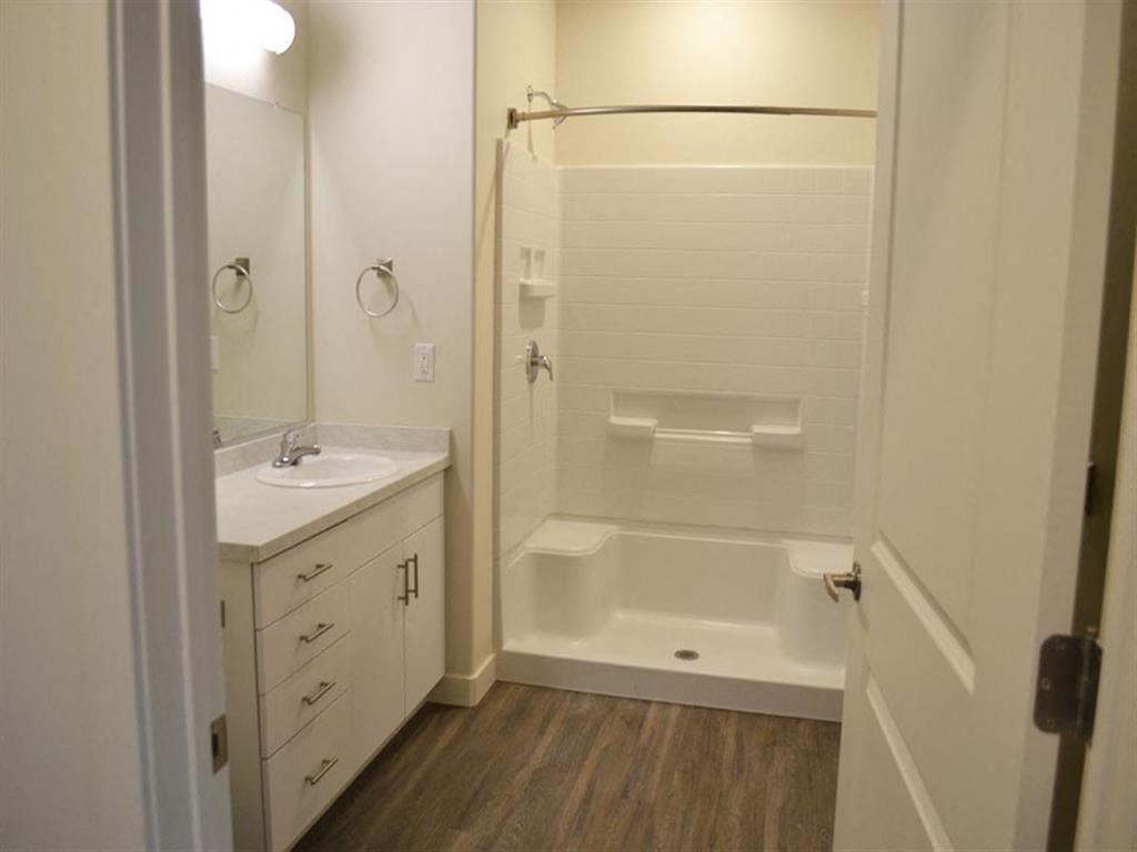 Main Bath with Walk-in Shower at Kimpton Square Senior Apartments