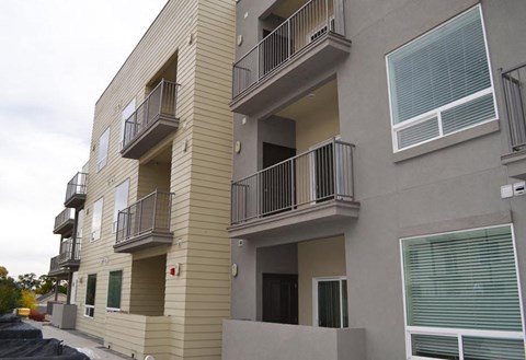 Exterior View with Balconies at Kimpton Square Senior Apartments, Midvale, UT