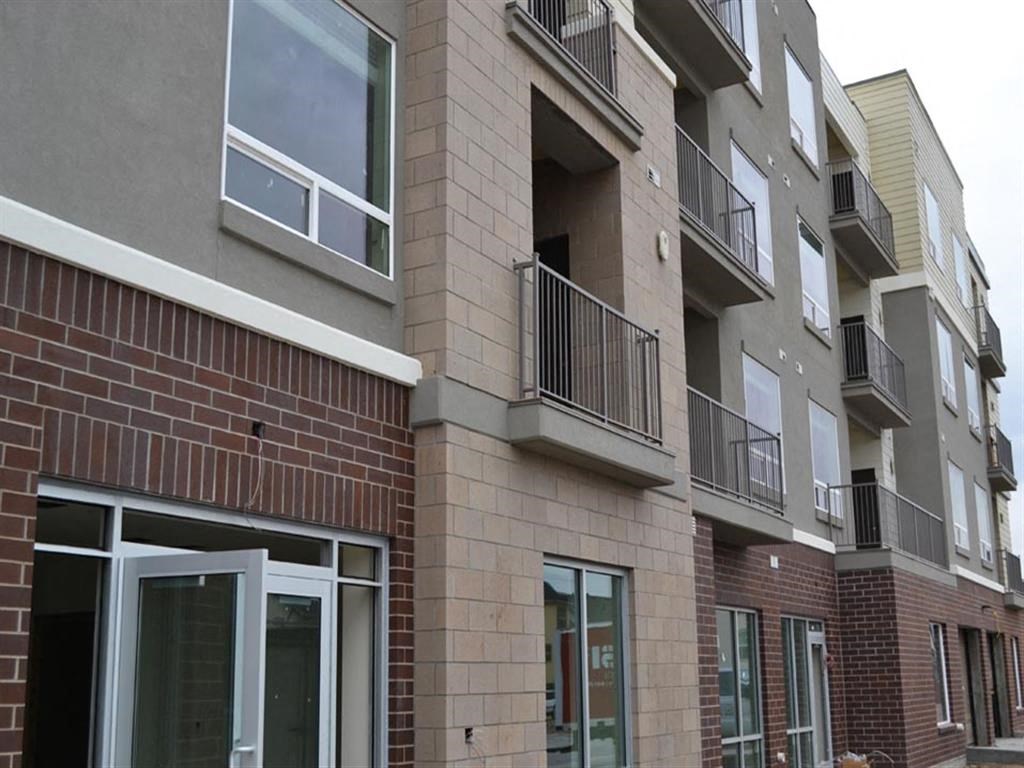 Exterior photo with balconies at Kimpton Square Senior Apartments, Midvale, UT