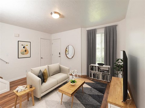 a living room with a couch and a tv