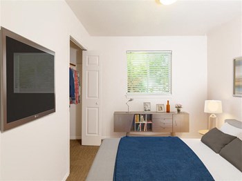 Spacious Bedroom With Comfortable Bed at Devonshire Court Apartments & Townhomes, North Logan, UT, 84341 - Photo Gallery 7